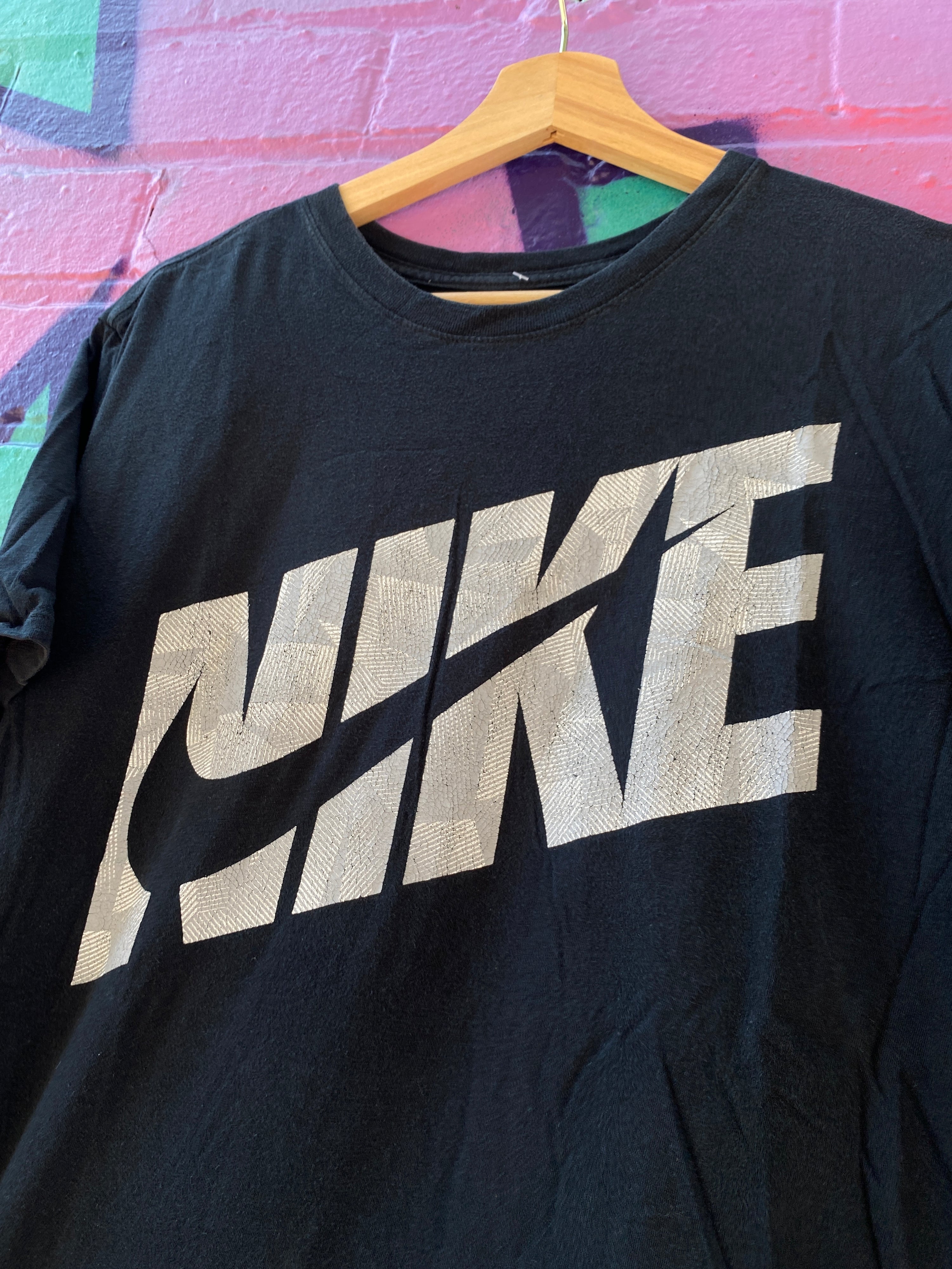 L - Nike Black Spellout Tick Through Front Tee
