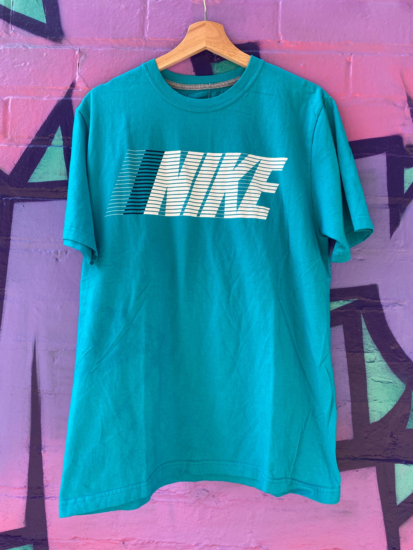 L - Turquoise Nike Lined Spellout Tee