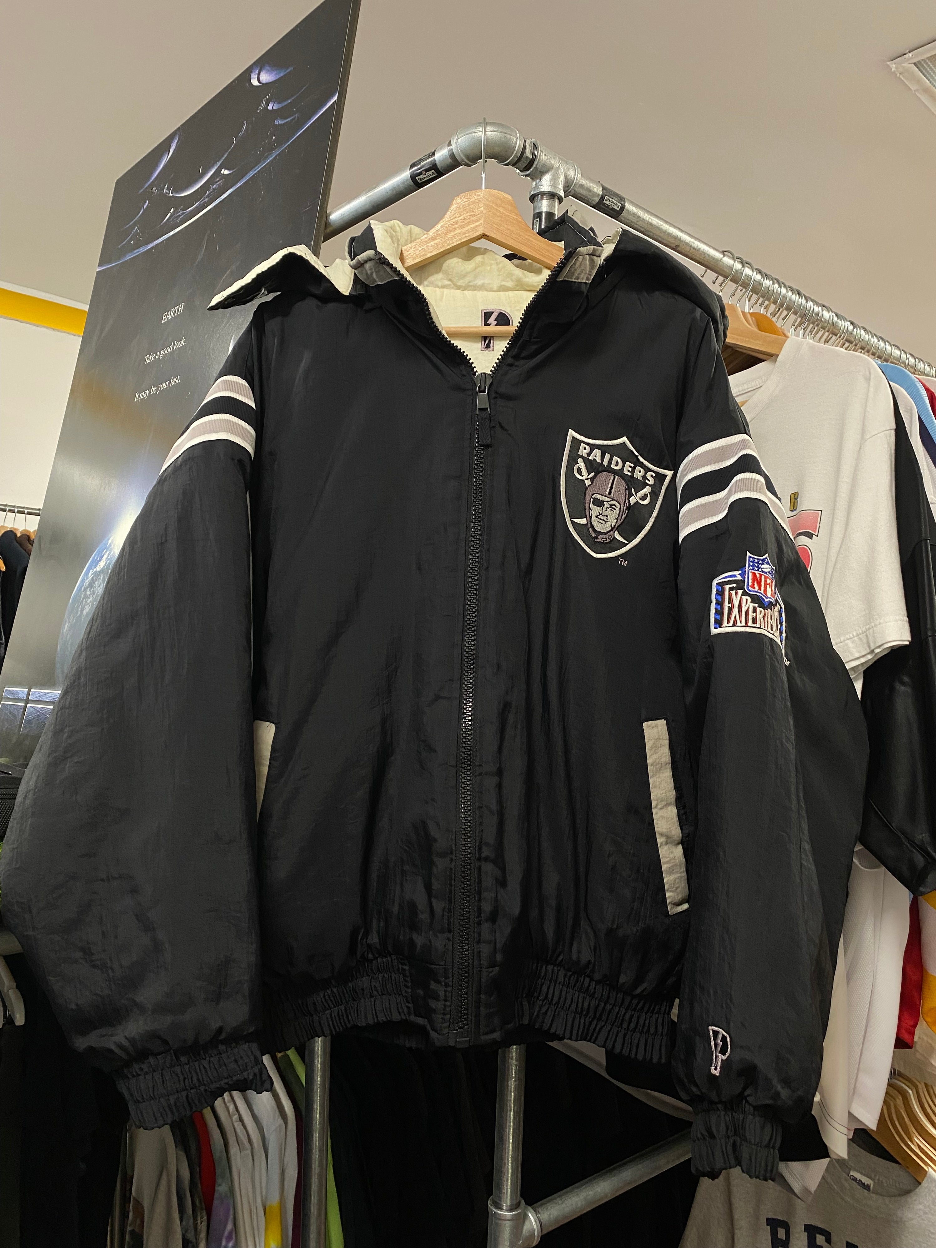 [L] Pro Player Reversible Raiders Puffer
