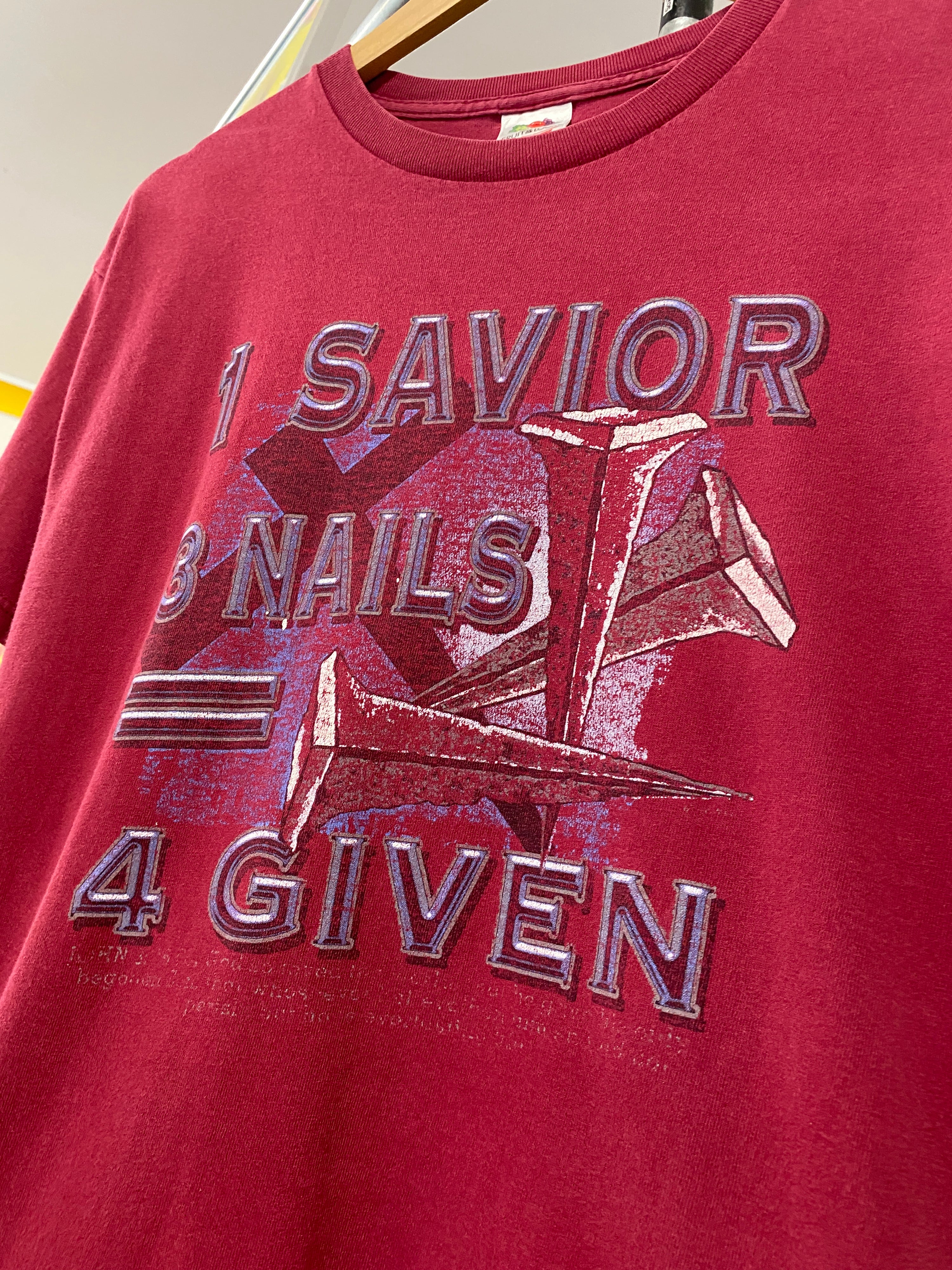 L - 1 Savior + 3 Nails = 4 Given Maroon Tee