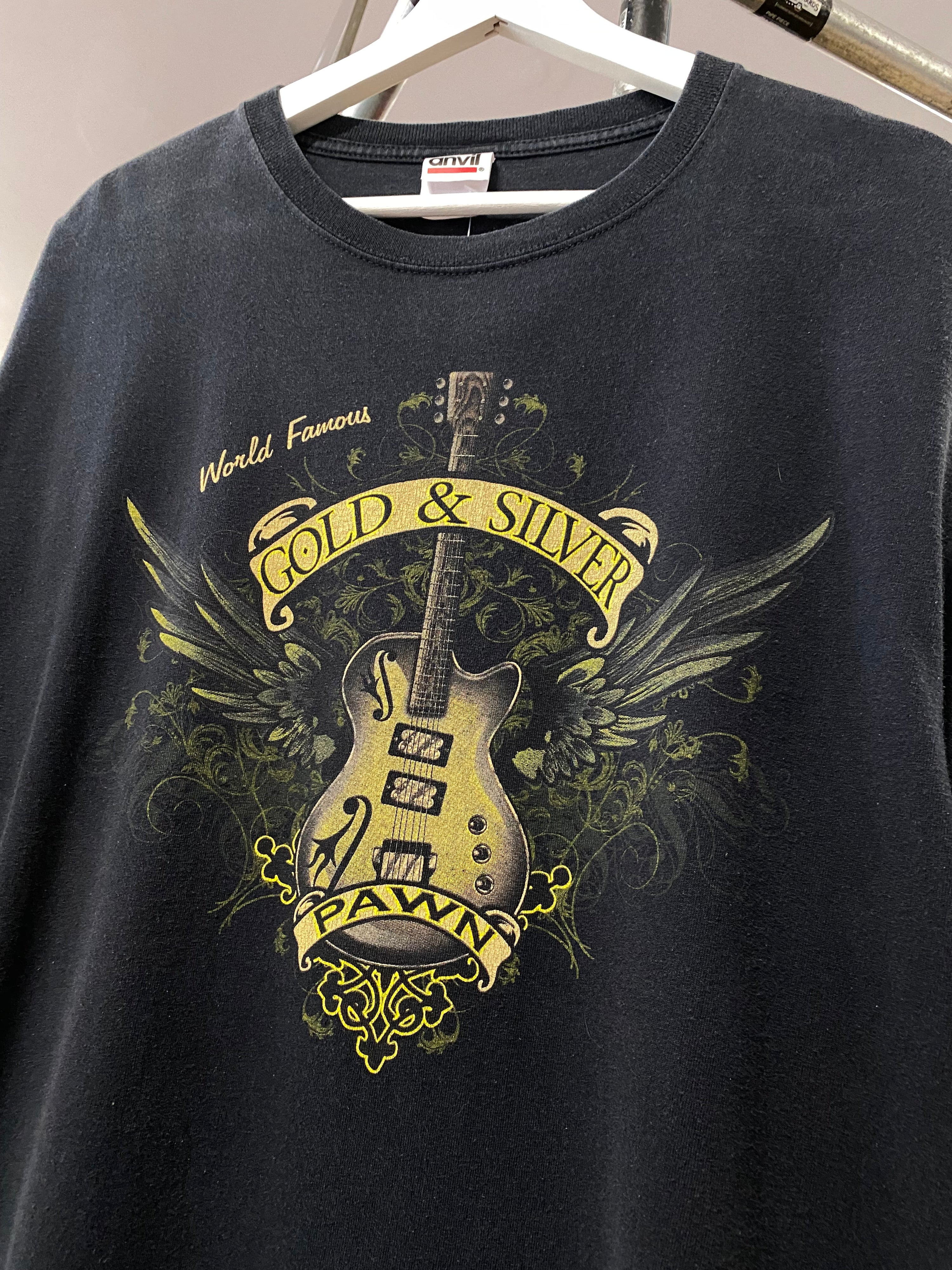 M - World Famous Gold And Silver Pawn Guitar