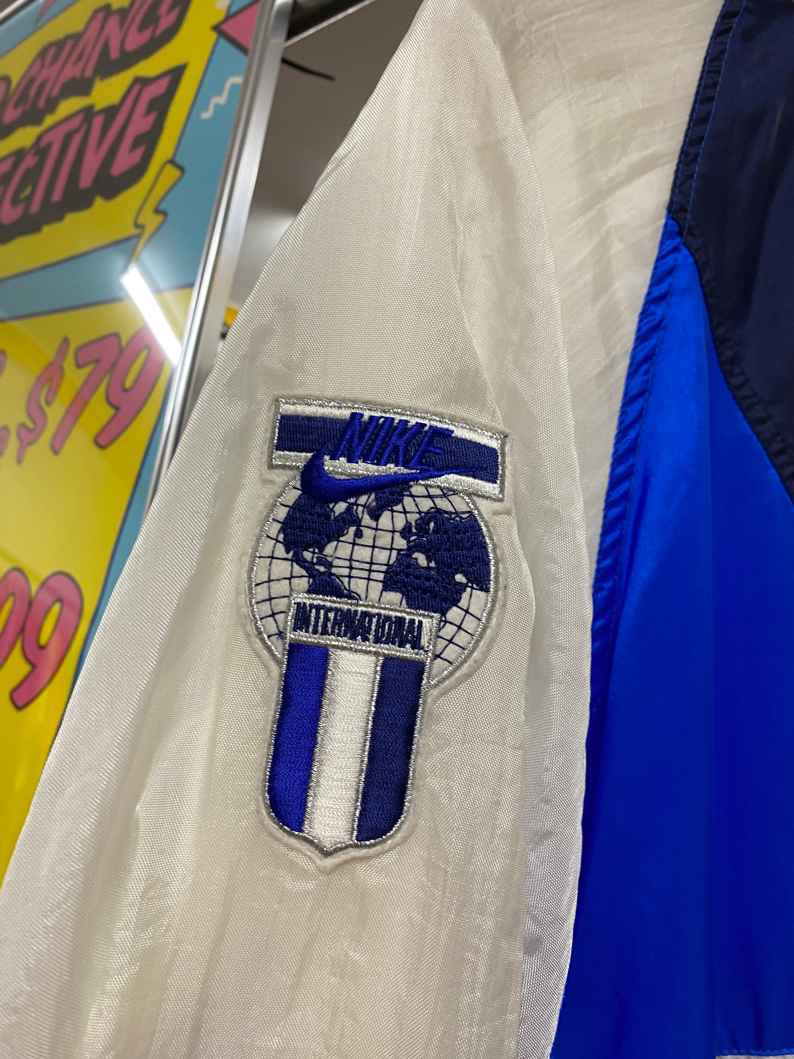 XL - Vintage Nike International Jacket: Blue/White Big Rear Print