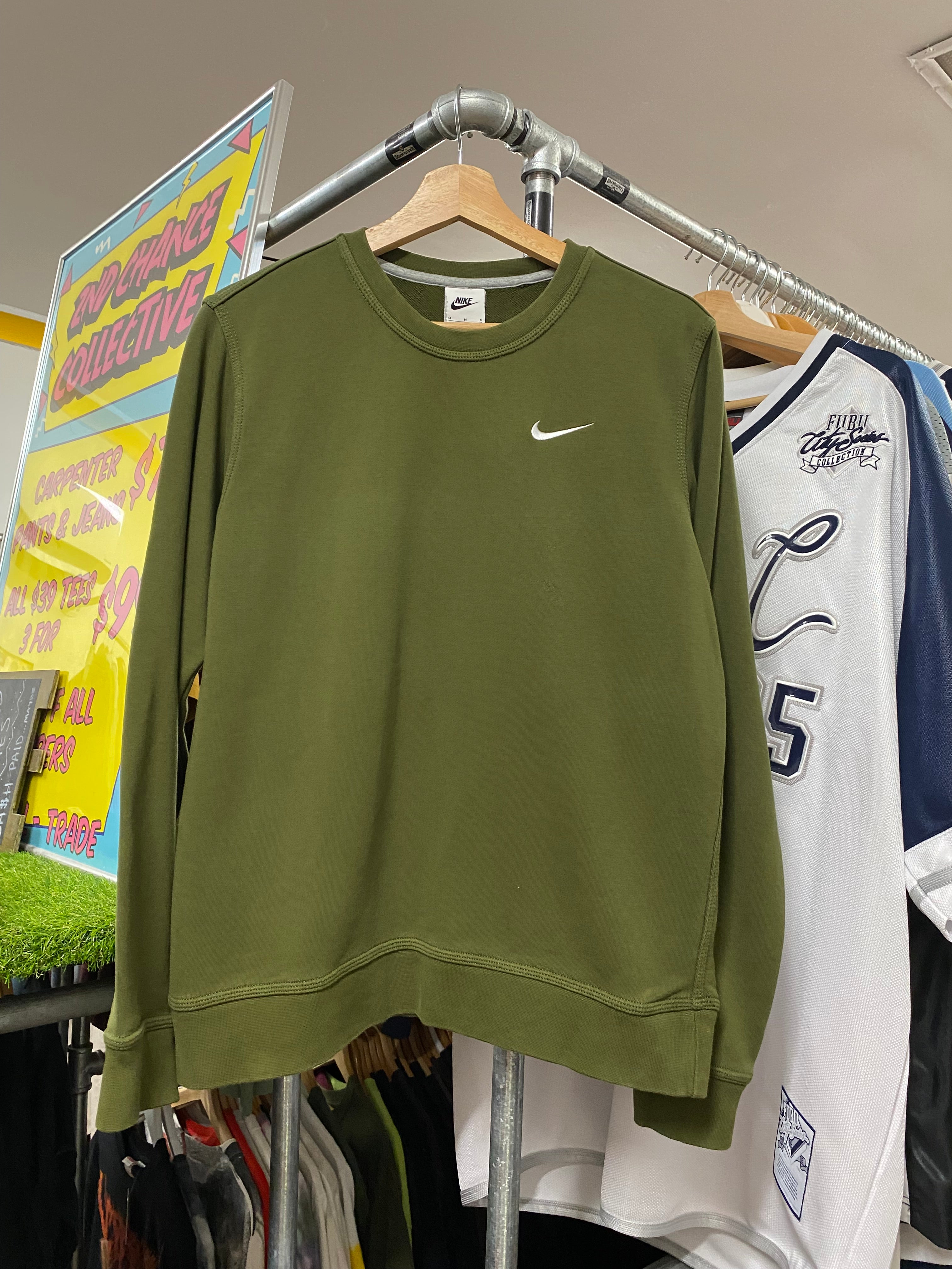 nike small tick sweatshirt