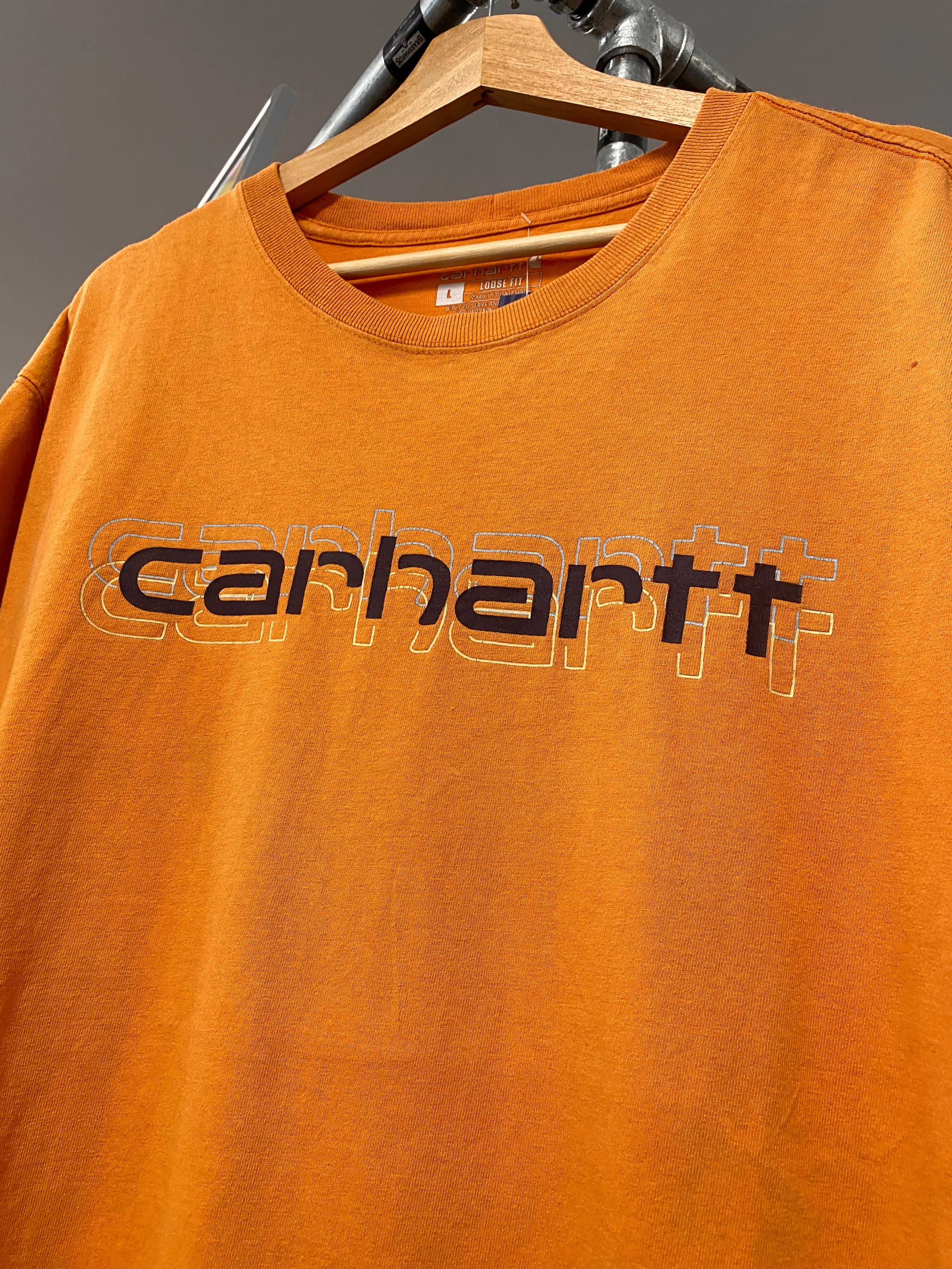 L - Carhartt Orange 3 Outline Spellout Tee