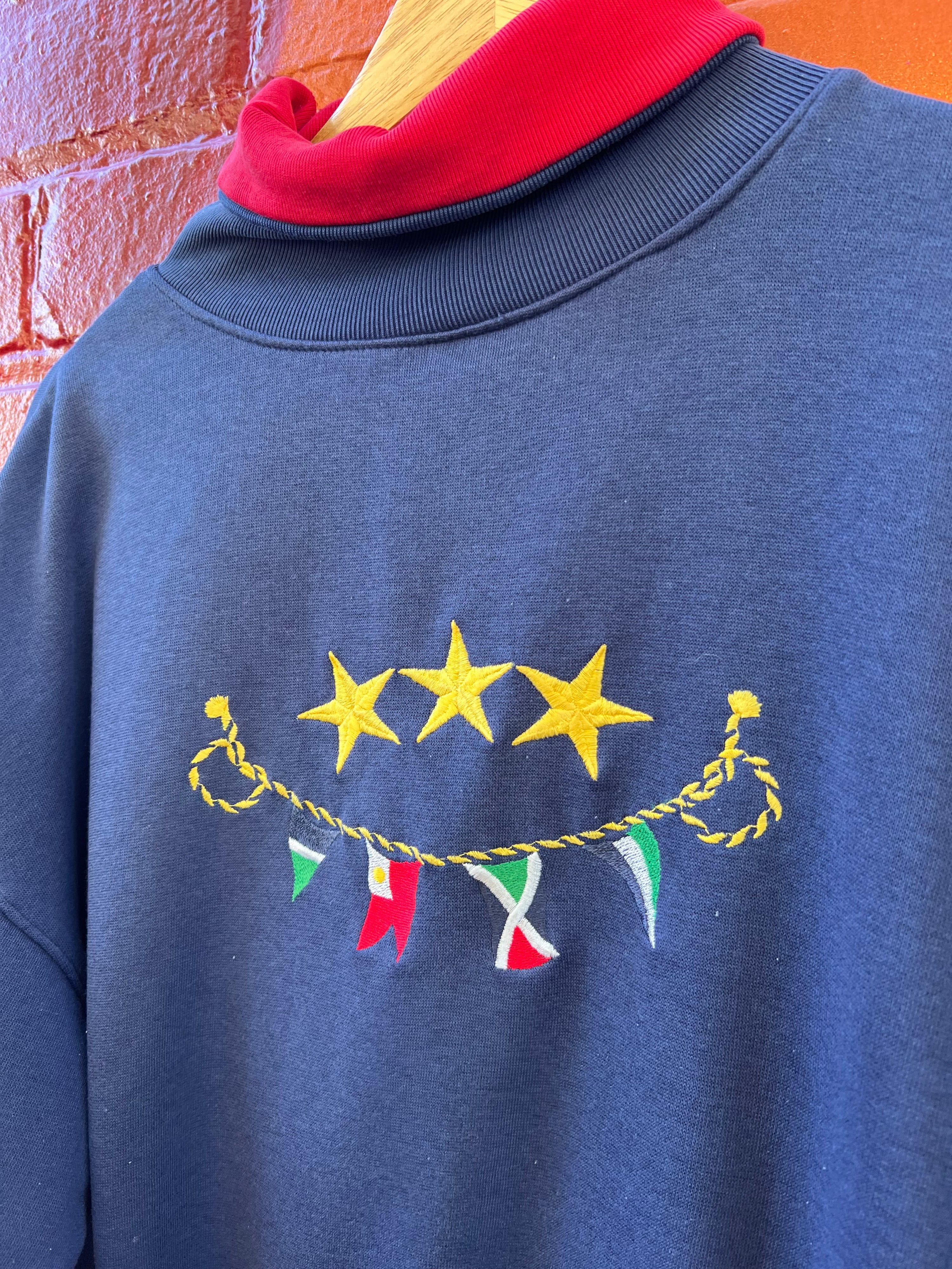 S - Embroidered Flag Mock Neck Jumper