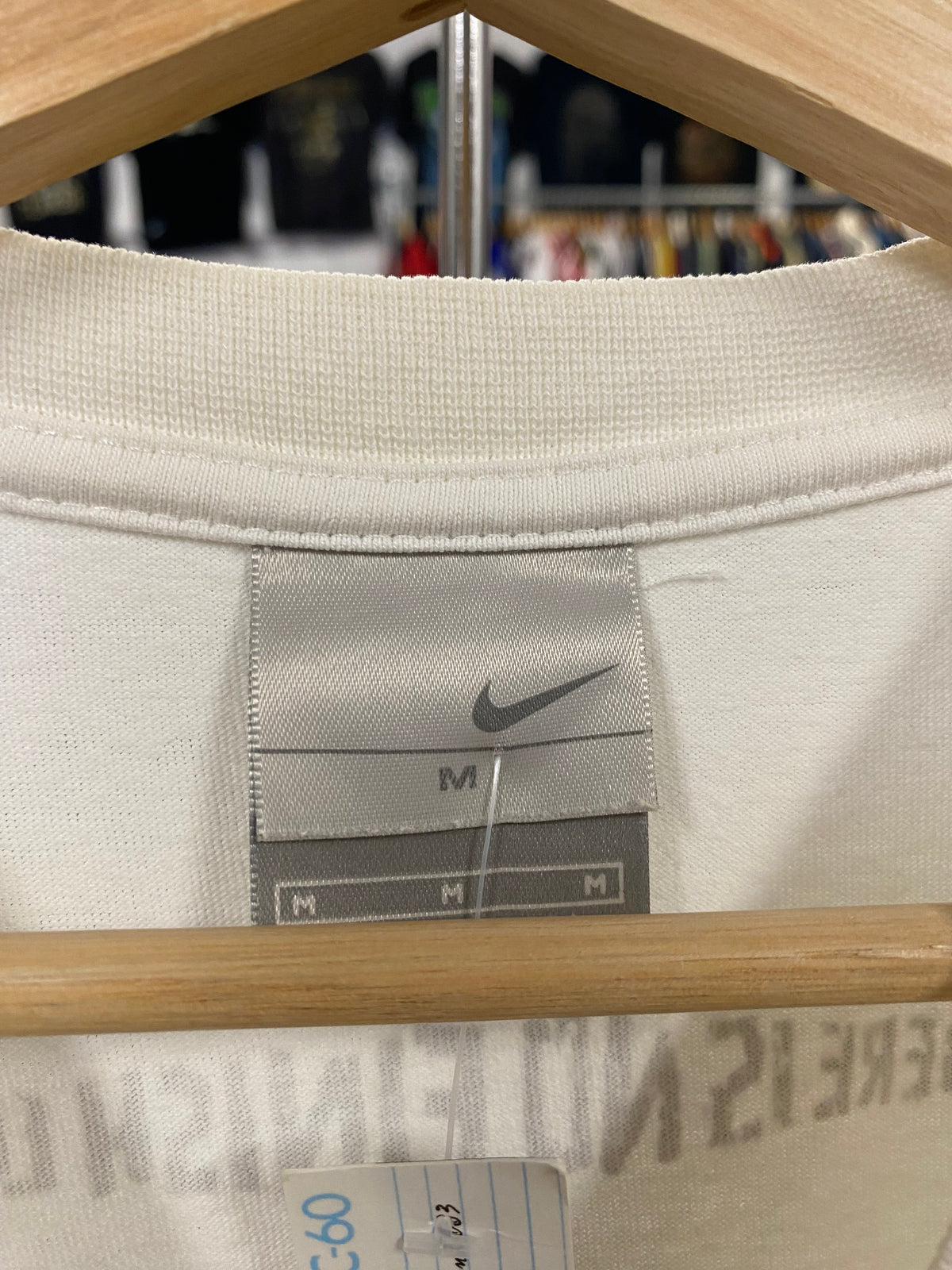 [M] Nike: It All Started With A Coach Building Shoes. White Tshirt