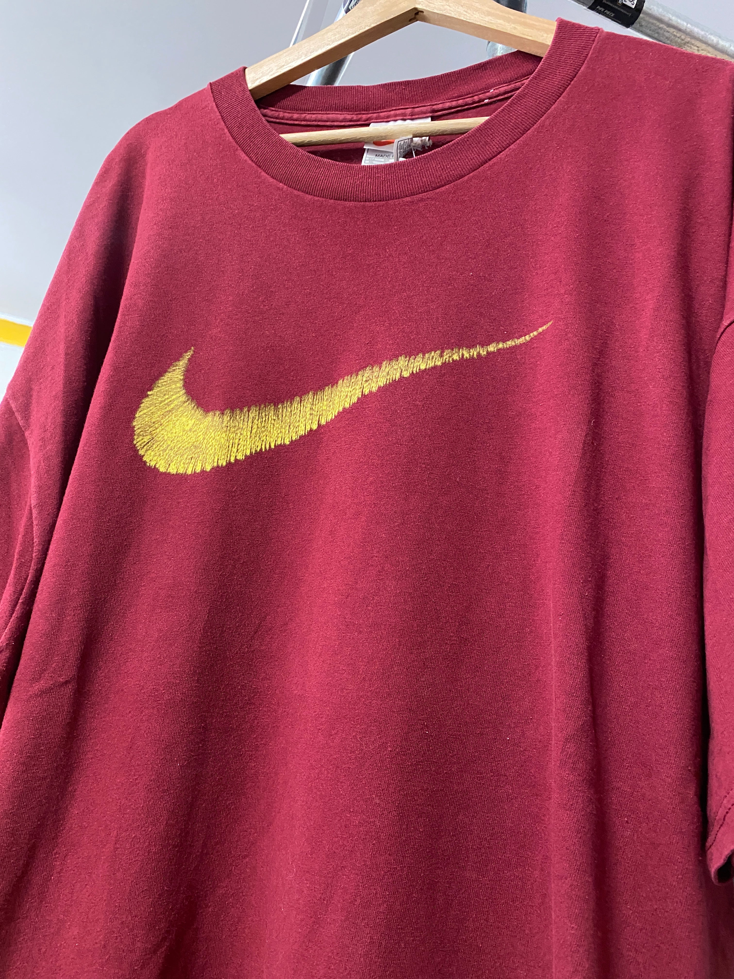 maroon and gold nike shirt