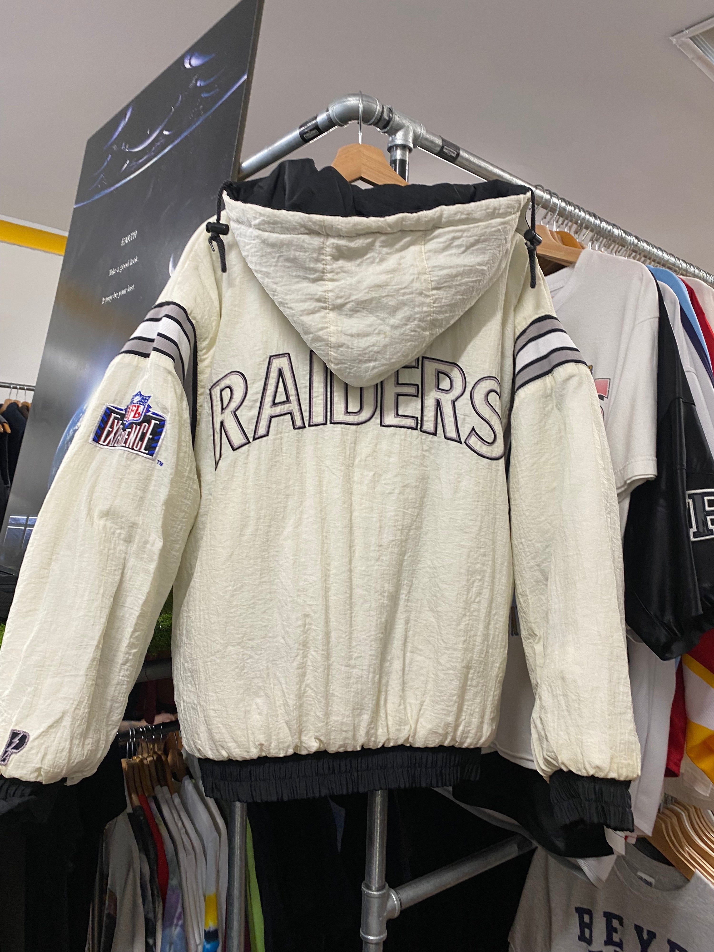 [L] Pro Player Reversible Raiders Puffer