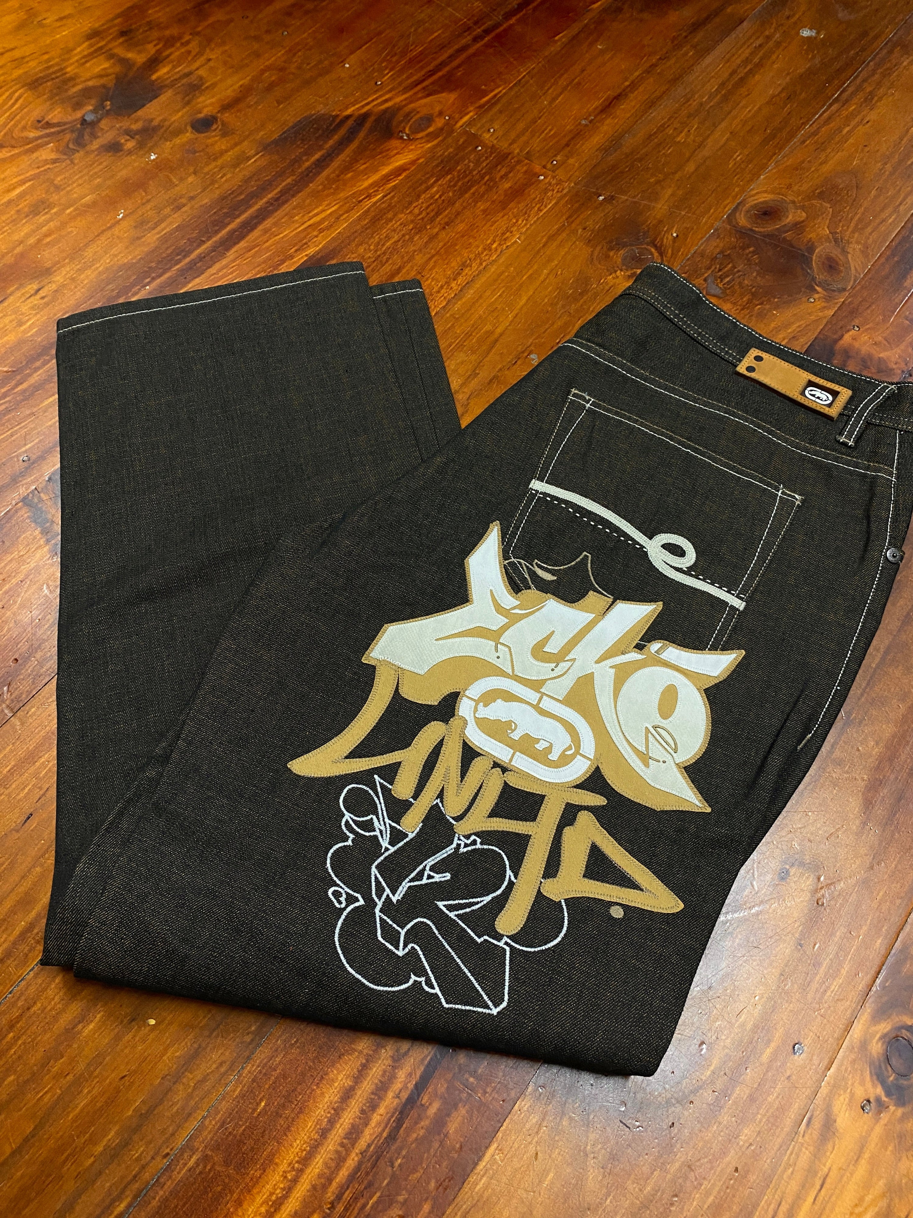 38 - ECKO Heavily Embroidered Rear Baggy Brown  Jeans
