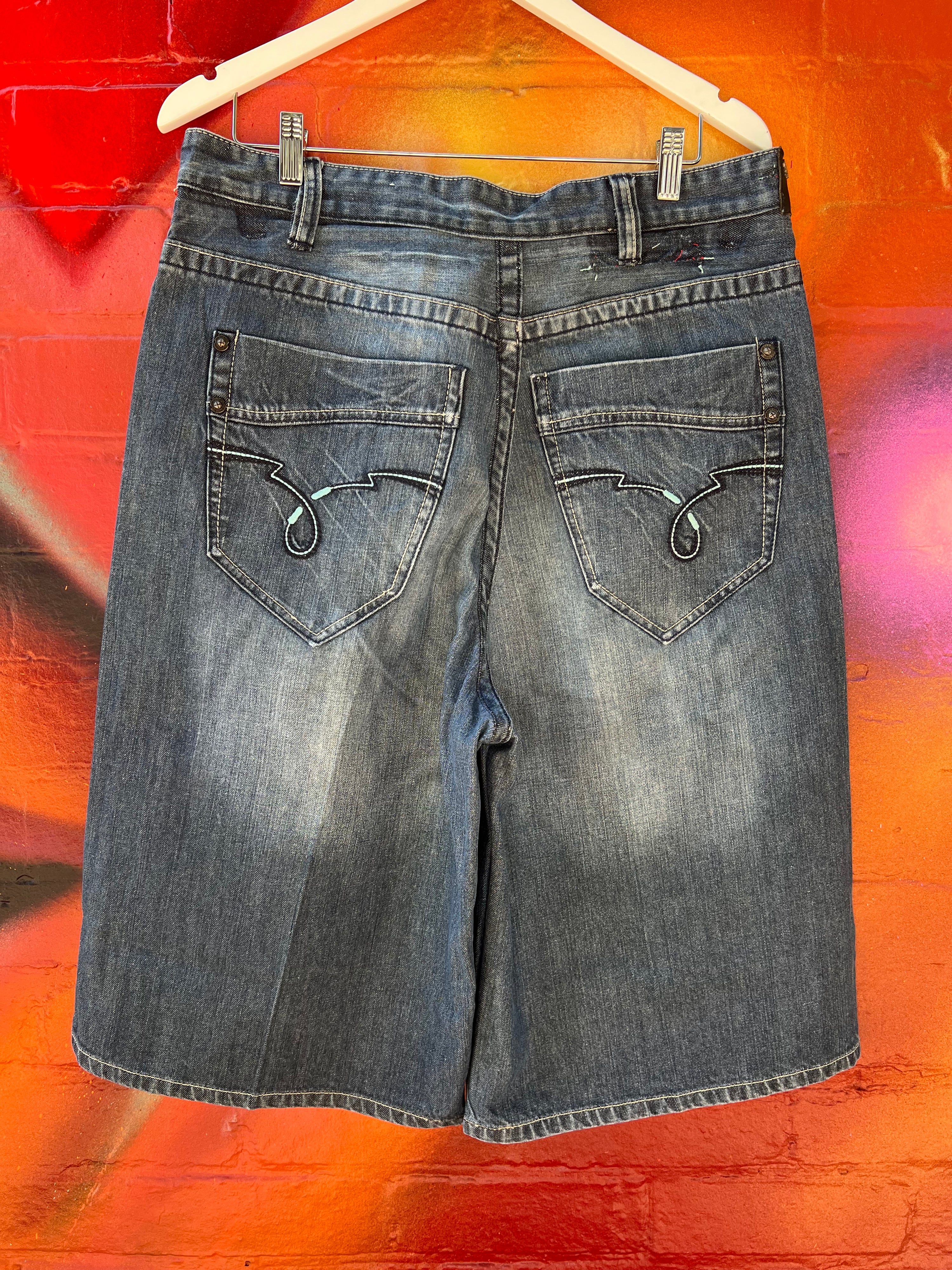 36 - Ecko Unltd Dark Denim Long Shorts