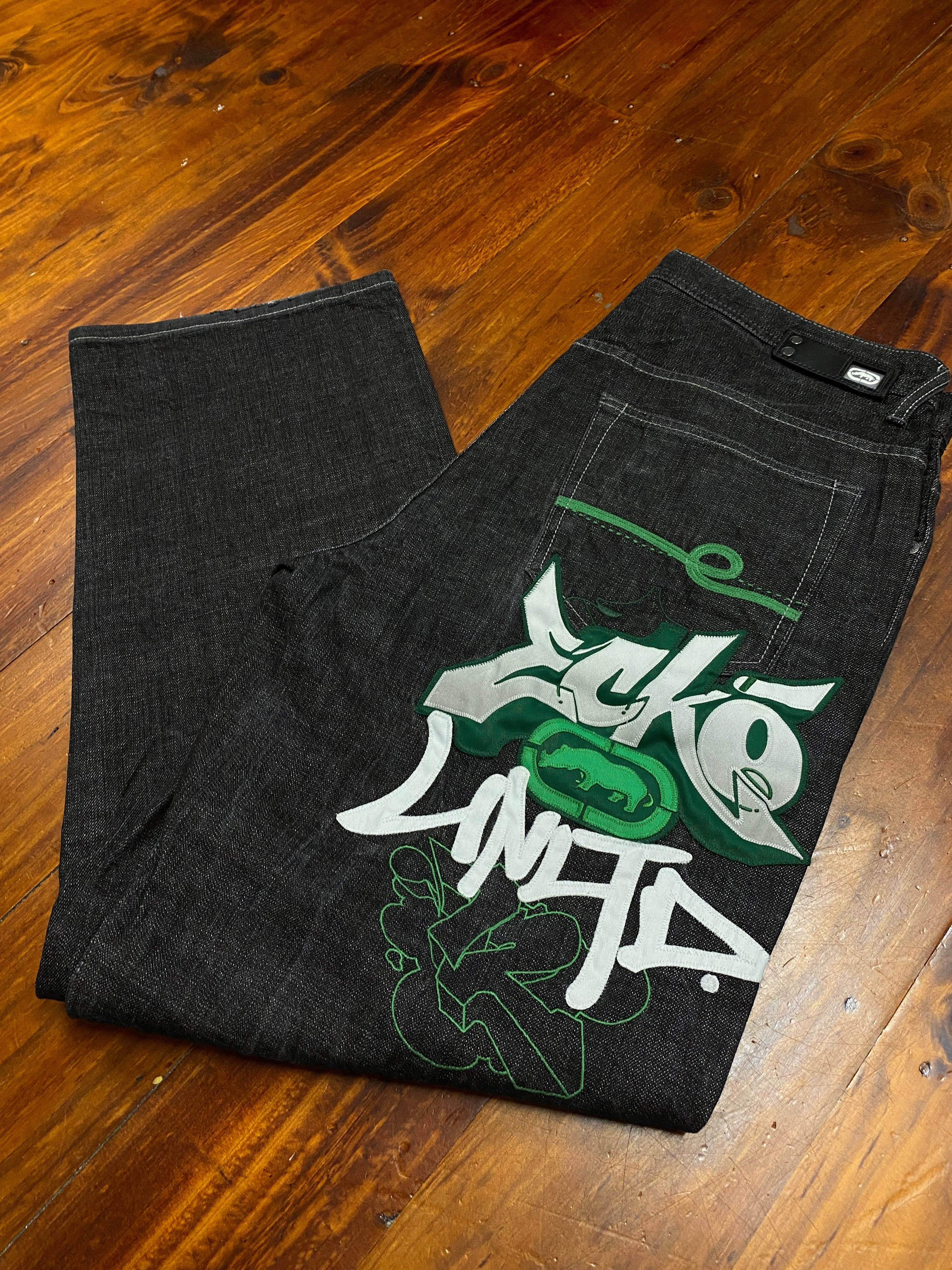 38 - ECKO Heavily Embroidered Rear Baggy Black Jeans