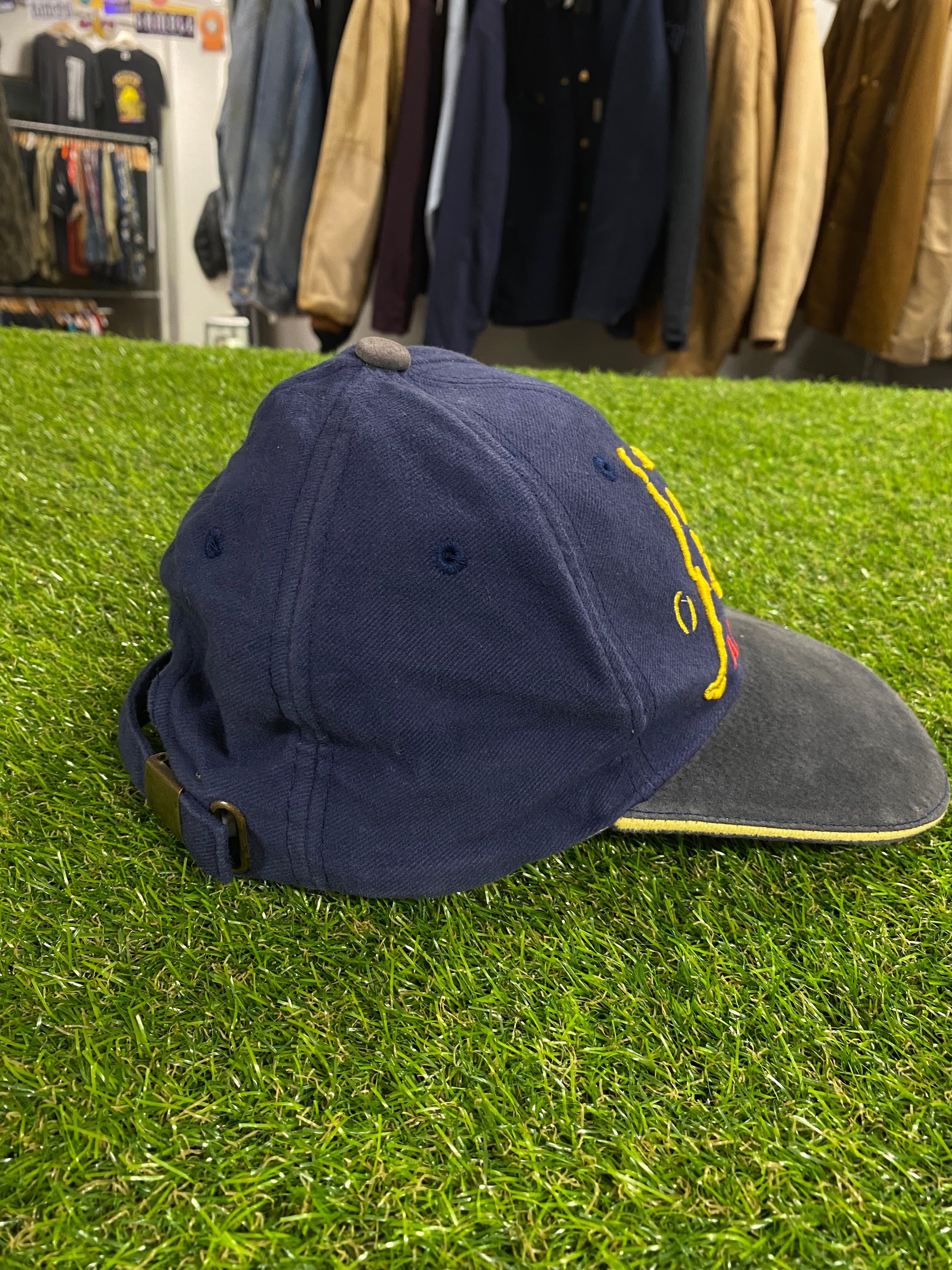 Vintage Adelaide Crows Cap Player Kicking Ball Outline