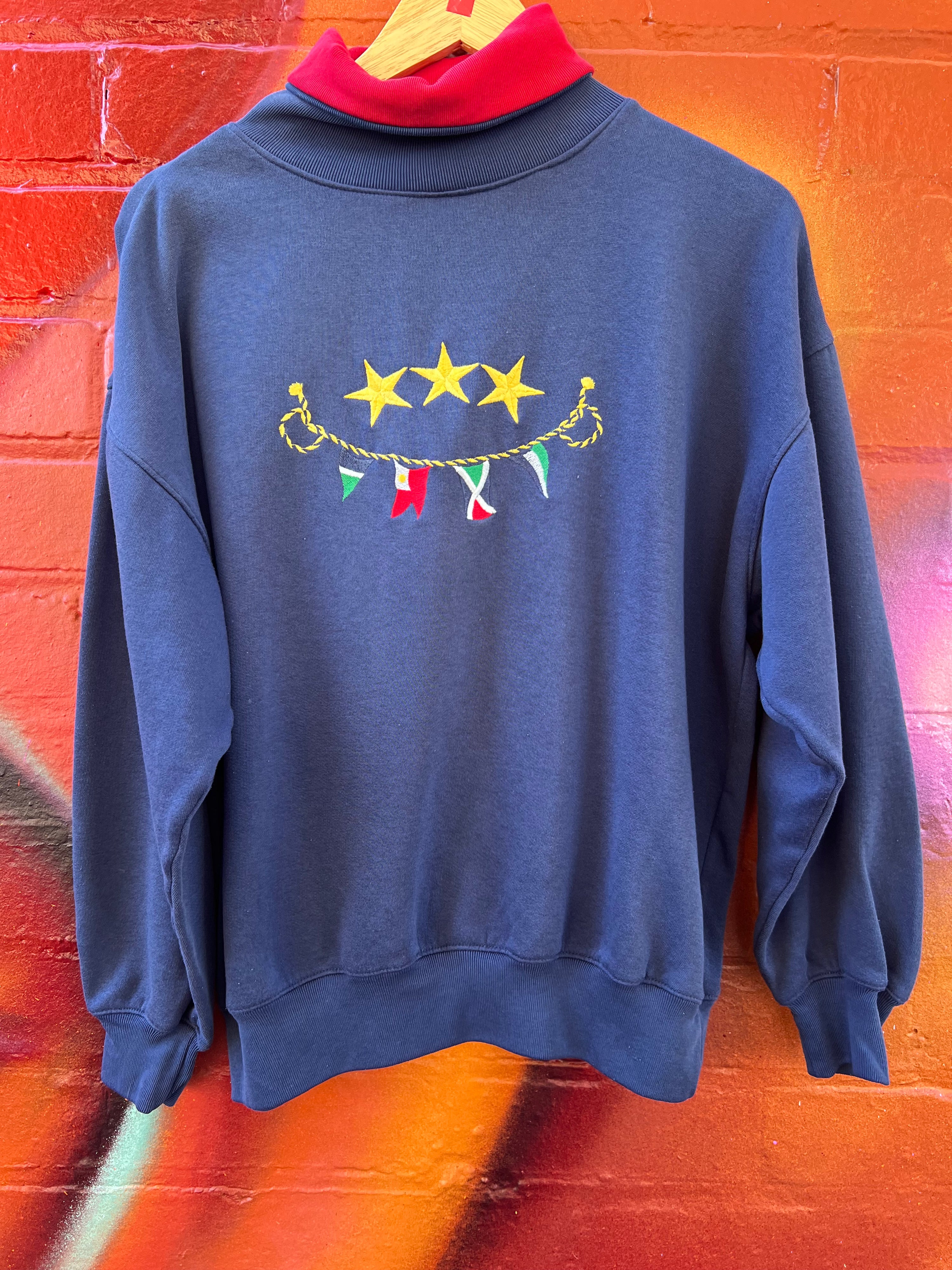 S - Embroidered Flag Mock Neck Jumper