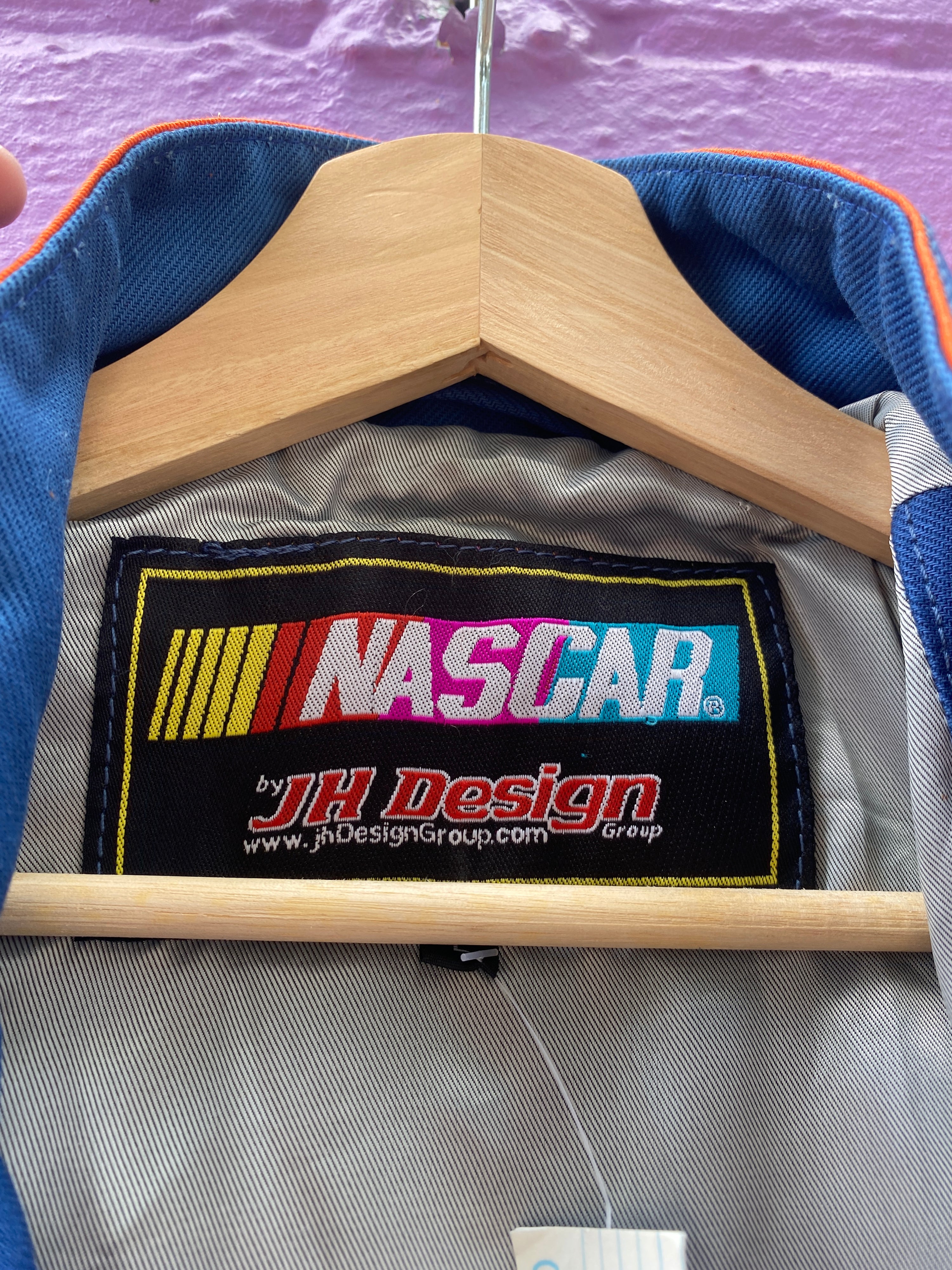 L - JH Designs CAT NASCAR Racing Jacket - Blue
